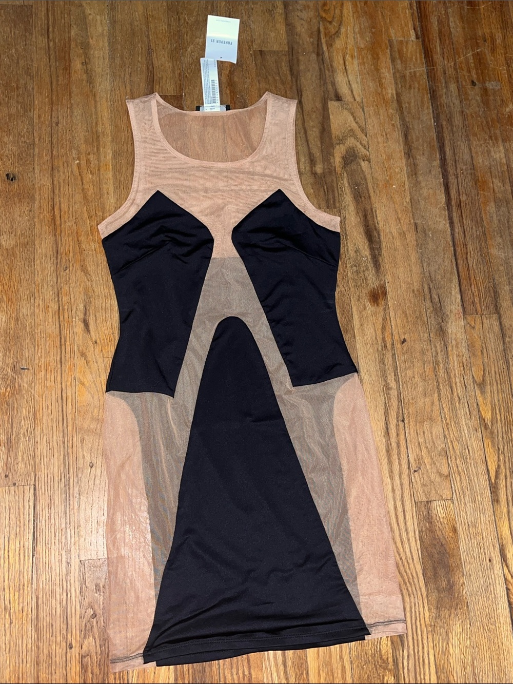 Black cutout and mesh naked look dress